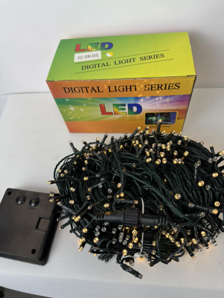 Вулична гірлянда-нитка на сонячній панелі 50 м на 500 LED (зелений дріт, тепле світло, фабрична якість)